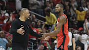 Nov 16, 2025; Houston, Texas, USA; Houston Rockets forward Kevin Durant (7) reacts with head coach Ime Udoka after a play during the fourth quarter against the Orlando Magic at Toyota Center. Mandatory Credit: Troy Taormina-Imagn Images