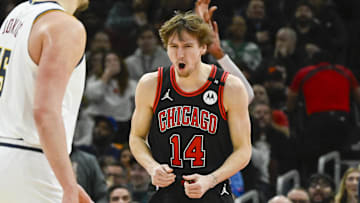 Jan 27, 2025; Chicago, Illinois, USA; Chicago Bulls forward Matas Buzelis (14) reacts after a dunk against the Denver Nuggets during the second half at the United Center. Mandatory Credit: Matt Marton-Imagn Images