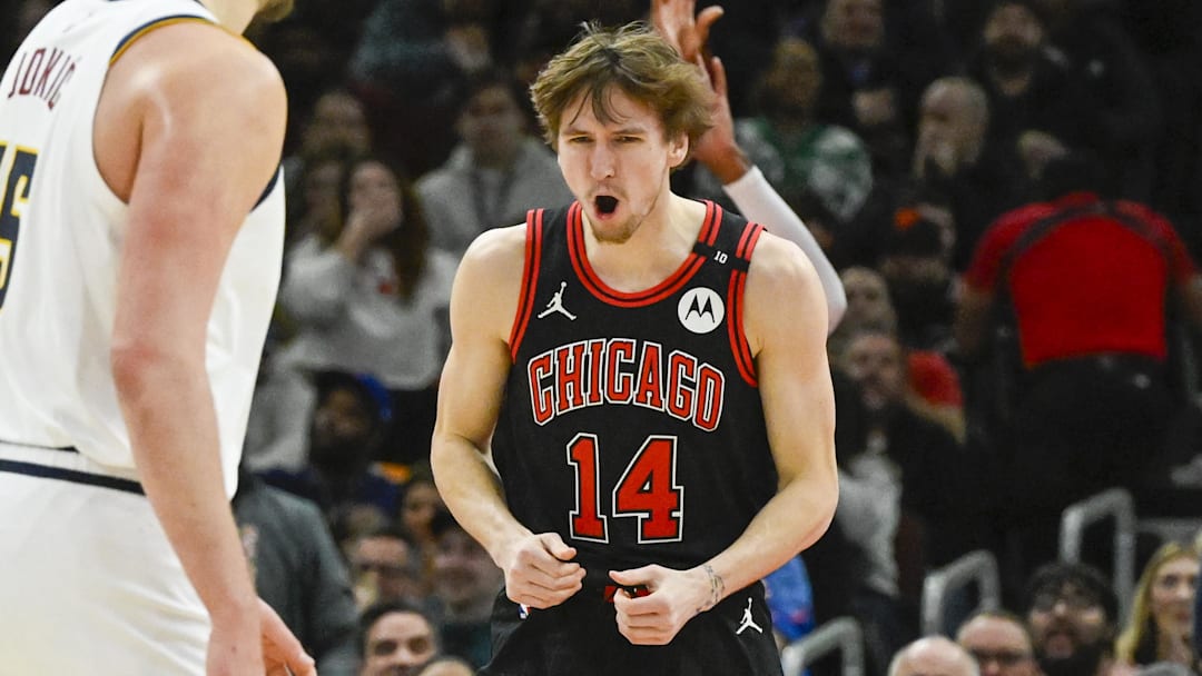 Jan 27, 2025; Chicago, Illinois, USA; Chicago Bulls forward Matas Buzelis (14) reacts after a dunk against the Denver Nuggets during the second half at the United Center. Mandatory Credit: Matt Marton-Imagn Images