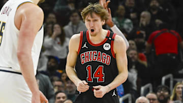 Jan 27, 2025; Chicago, Illinois, USA; Chicago Bulls forward Matas Buzelis (14) reacts after a dunk against the Denver Nuggets during the second half at the United Center. Mandatory Credit: Matt Marton-Imagn Images