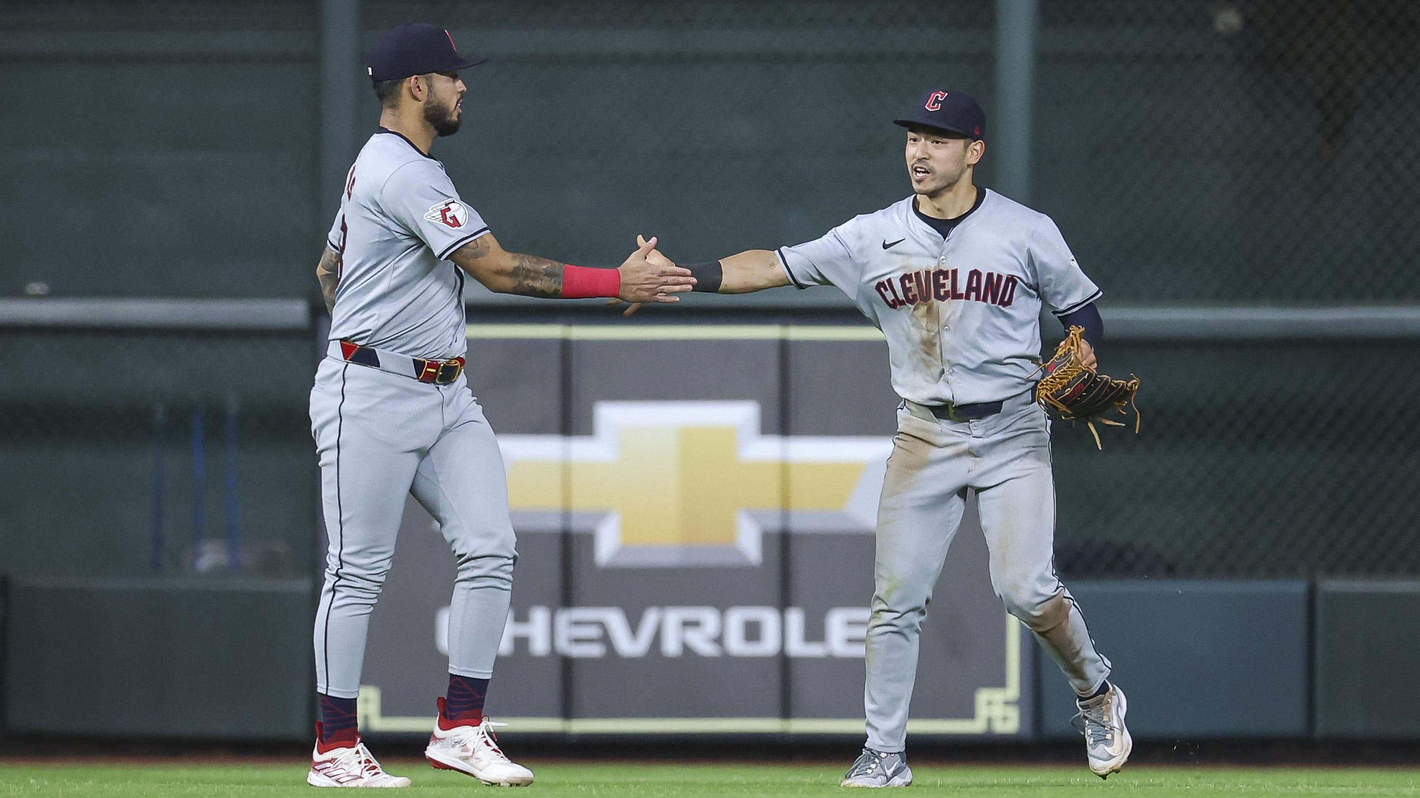 May 1, 2024; Houston, Texas, USA;  Cleveland Guardians left fielder Steven Kwan (38) celebrates with Gabriel Arias (13).