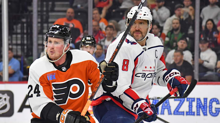 Apr 16, 2024; Philadelphia, Pennsylvania, USA; Philadelphia Flyers defenseman Nick Seeler (24) and Washington Capitals left wing Alex Ovechkin (8) battle for position during the first period at Wells Fargo Center. Mandatory Credit: Eric Hartline-Imagn Images