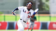 Team USA's Jorvorskie Lane Jr., of Grapevine (Texas), scored on a bases-clearing single by Andrew Costello of Cathedral Prep (Pennsylvania) in the sixth inning on Tuesday. The U.S. grabbed an 11-1, run-rule victory over Australia.