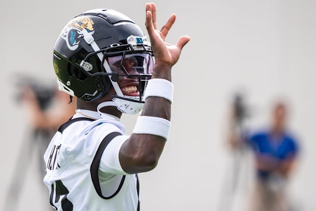 Jacksonville Jaguars wide receiver Travis Hunter (12) waves to someone in the stands during the Jacksonville Jaguars’ mandato