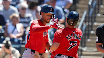 Mar 18, 2025; Tampa, Florida, USA; Boston Red Sox outfielder Masataka Yoshida (7) celebrates with second baseman Kristian Campbell (28) after hitting a two run home run against the New York Yankees in the sixth inning during spring training at George M. Steinbrenner Field. Mandatory Credit: Nathan Ray Seebeck-Imagn Images