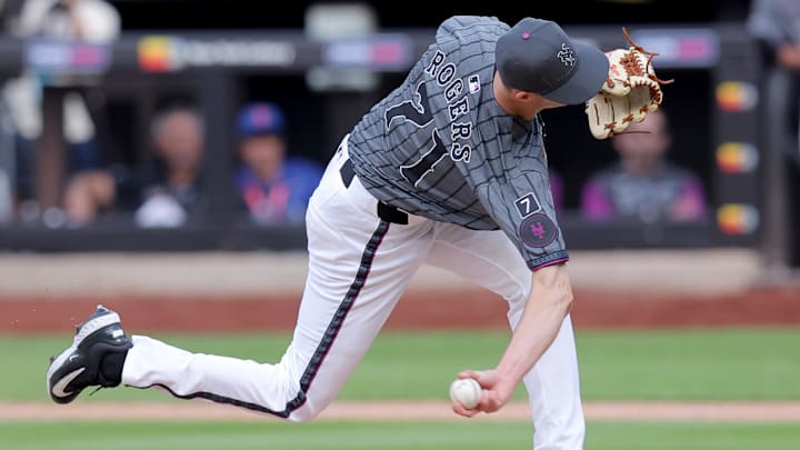 Aug 2, 2025; New York City, New York, USA; New York Mets relief pitcher Tyler Rogers (71) pitches against the San Francisco Giants. Mandatory Credit: Brad Penner-Imagn Images