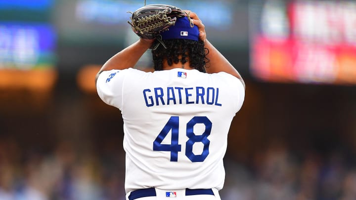 Jun 25, 2023; Los Angeles, California, USA; Los Angeles Dodgers relief pitcher Brusdar Graterol (48) reacts during the tenth inning at Dodger Stadium. Mandatory Credit: Gary A. Vasquez-USA TODAY Sports