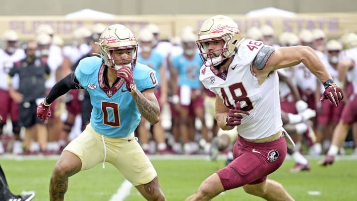Apr 20, 2024; Tallahassee, Florida, USA; Florida State Seminoles defensive back Earl Little Jr (0) defends tight end Jackson West (48) during the Spring Showcase at Doak S. Campbell Stadium. Mandatory Credit: Melina Myers-USA TODAY Sports