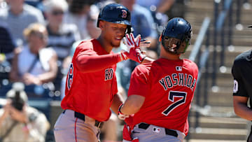 Mar 18, 2025; Tampa, Florida, USA; Boston Red Sox outfielder Masataka Yoshida (7) celebrates with second baseman Kristian Campbell (28) after hitting a two run home run against the New York Yankees in the sixth inning during spring training at George M. Steinbrenner Field. Mandatory Credit: Nathan Ray Seebeck-Imagn Images