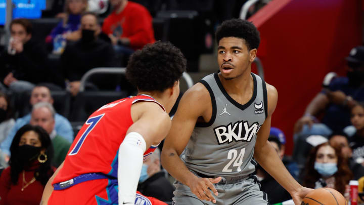 Dec 12, 2021; Detroit, Michigan, USA;  Brooklyn Nets guard Cam Thomas (24) dribbles defended by Detroit Pistons guard Killian Hayes (7) at Little Caesars Arena. Mandatory Credit: Rick Osentoski-USA TODAY Sports