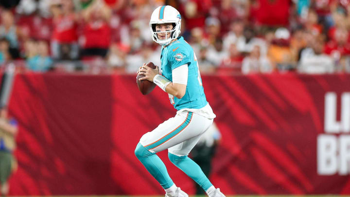 Miami Dolphins quarterback Mike White (14) drops back to pass against the Tampa Bay Buccaneers in the first quarter during preseason at Raymond James Stadium.