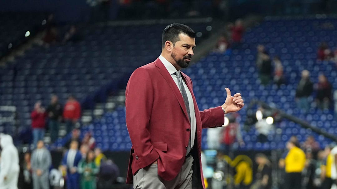 Ohio State Buckeyes head coach Ryan Day walks out on the field after arriving prior to the Big Ten Conference championship game against the Indiana Hoosiers at Lucas Oil Stadium in Indianapolis on Dec. 6, 2025.