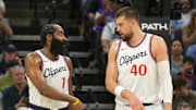 Apr 11, 2025; Sacramento, California, USA; Los Angeles Clippers guard James Harden (1) and center Ivica Zubac (40) talk during the third quarter against the Sacramento Kings at Golden 1 Center. Mandatory Credit: Darren Yamashita-Imagn Images