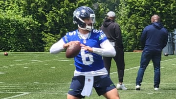 Seahawks quarterback Sam Howell prepares to throw during individual drills at the team's second open OTA practice.
