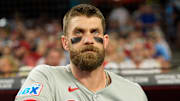 Sep 19, 2025; Phoenix, Arizona, USA;  Philadelphia Phillies infielder Bryce Harper (3) watches on from the dugout before his first at bat of the game against the Arizona Diamondbacks at Chase Field. Mandatory Credit: Allan Henry-Imagn Images