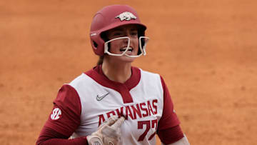 Arkansas infielder Bri Ellis (77) celebrates after hitting a walkout grand slam to win the game during a SEC softball tournament second round game against Georgia in Athens, Ga., on Wednesday, May 7, 2025. Arkansas won 5-1.