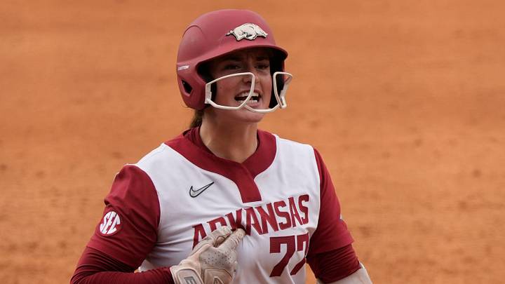 Arkansas infielder Bri Ellis (77) celebrates after hitting a walkout grand slam to win the game during a SEC softball tournament second round game against Georgia in Athens, Ga., on Wednesday, May 7, 2025. Arkansas won 5-1.