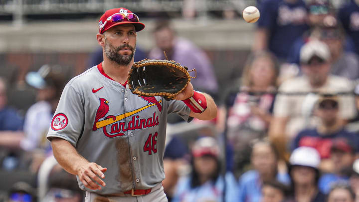 Jul 21, 2024; Cumberland, Georgia, USA; St. Louis Cardinals first baseman Paul Goldschmidt (46) records an out against the Atlanta Braves during the eighth inning at Truist Park. Mandatory Credit: Dale Zanine-USA TODAY Sports