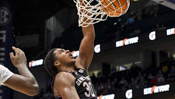 Mar 12, 2025; Nashville, TN, USA;  South Carolina Gamecocks forward Collin Murray-Boyles (30) dunks the ball against the Arkansas Razorbacks during the second half at Bridgestone Arena. Mandatory Credit: Steve Roberts-Imagn Images