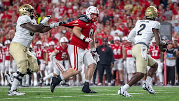 Nebraska defensive lineman Nash Hutmacher chases after Colorado quarterback Shedeur Sanders during the third quarter. Holding was not called on the play.