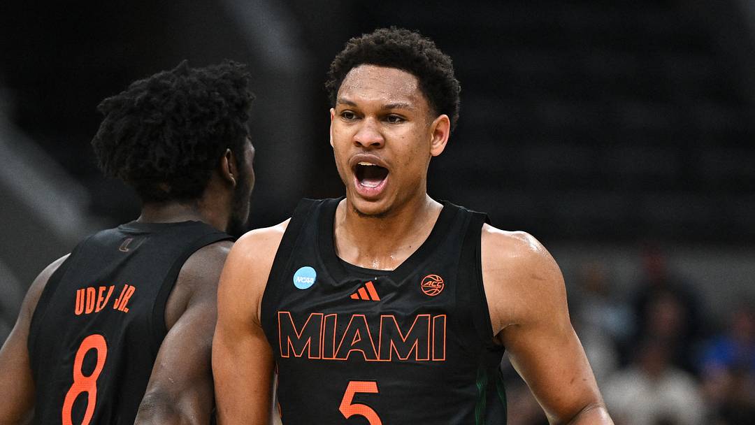 Mar 22, 2026; St. Louis, MO, USA; Miami Hurricanes forward Malik Reneau (5) celebrates with Miami Hurricanes center Ernest Udeh Jr. (8) after a play during the first half against the Purdue Boilermakers during a second round game of the men's 2026 NCAA Tournament at Enterprise Center. Mandatory Credit: Jeff Le-Imagn Images Mar 22, 2026; St. Louis, MO, USA; Miami Hurricanes forward Malik Reneau (5) celebrates with Miami Hurricanes center Ernest Udeh Jr. (8) after a play during the first half against the Purdue Boilermakers during a second round game of the men's 2026 NCAA Tournament at Enterprise Center. Mandatory Credit: Jeff Le-Imagn Images