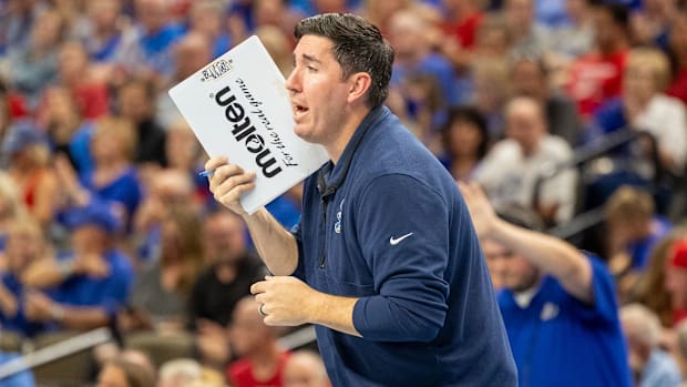 Creighton volleyball coach Brian Rosen coaches the Bluejays at the CHI Health Center during a September match