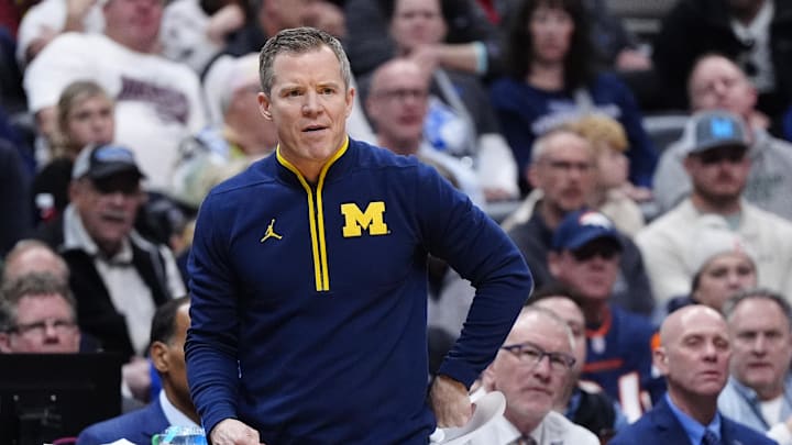 Mar 22, 2025; Denver, CO, USA; Michigan Wolverines head coach Dusty May during the first half in the second round of the NCAA Tournament  at Ball Arena. Mandatory Credit: Ron Chenoy-Imagn Images