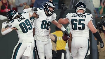 Former Philadelphia Eagles tight end Dallas Goedert (88) celebrates his touchdown against the Tampa Bay Buccaneers with tight end Jack Stoll (89) at Raymond James Stadium.