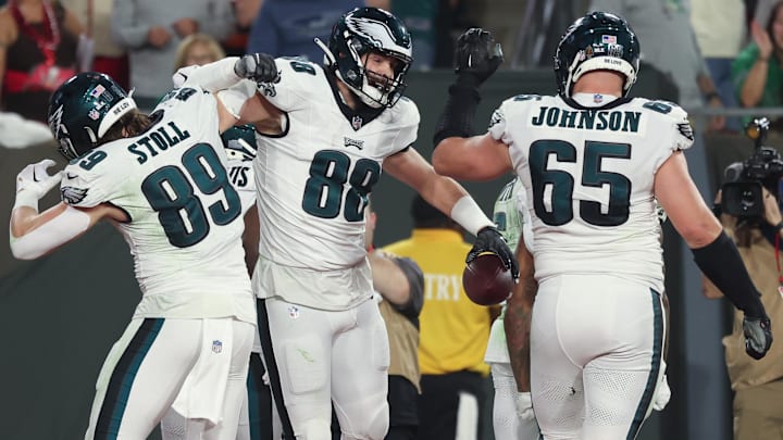 Former Philadelphia Eagles tight end Dallas Goedert (88) celebrates his touchdown against the Tampa Bay Buccaneers with tight end Jack Stoll (89) at Raymond James Stadium.
