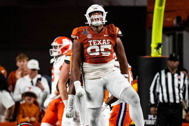 Texas Longhorns defensive lineman Alfred Collins celebrates a quarterback sack in the fourth quarter vs. the Clemson Tigers