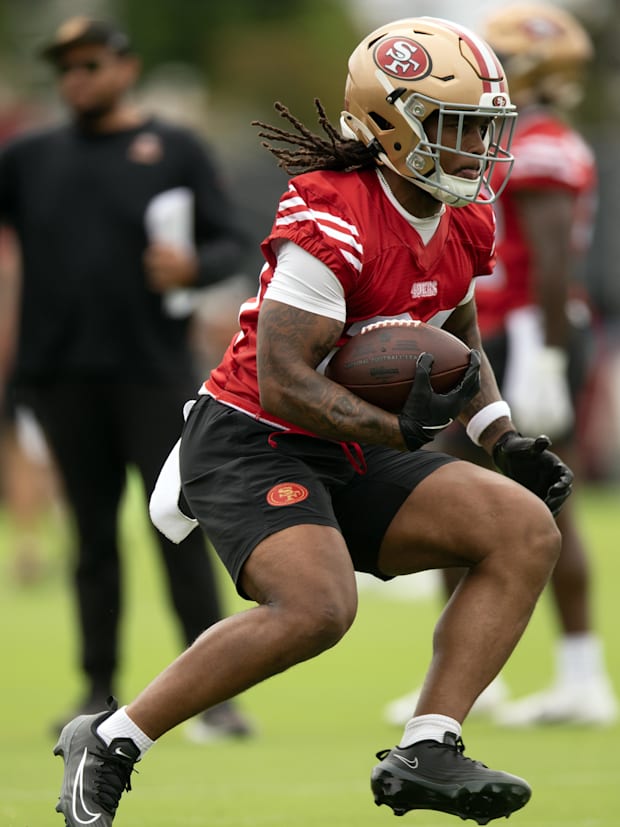 San Francisco 49ers running back Jordan James (29) runs a play from scrimmage during the second day of training camp.
