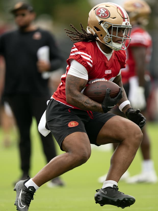 San Francisco 49ers running back Jordan James (29) runs a play from scrimmage during the second day of training camp.