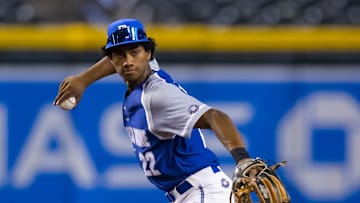 Aug 28, 2022; Phoenix, Arizona, US; East infielder Arjun Nimmala (22) during the Perfect Game All-American Classic high school baseball game at Chase Field. Mandatory Credit: Mark J. Rebilas-Imagn Images