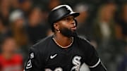 Chicago White Sox center fielder Luis Robert Jr. (88) hits a home run against the Seattle Mariners at T-Mobile Park. 