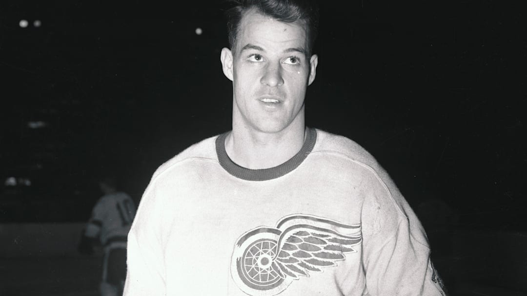 Gordon Howe on Ice With Hockey Stick