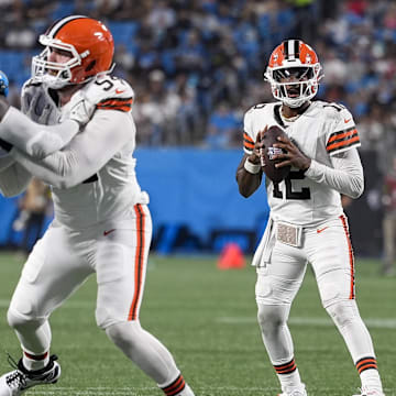 Aug 8, 2025; Charlotte, North Carolina, USA; Cleveland Browns quarterback Shedeur Sanders (12) looks downfield for a receiver  during the second half against the Carolina Panthers at Bank of America Stadium. Mandatory Credit: Jim Dedmon-Imagn Images