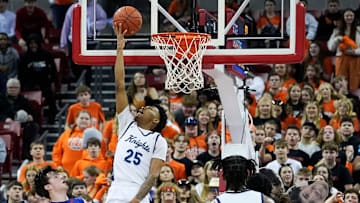 Nicolet's Davion Hannah (25) scores during the second half of the WIAA Division 2 boys basketball state semifinal game against Wisconsin Lutheran on Friday March 15, 2024 at the Kohl Center in Madison, Wis.