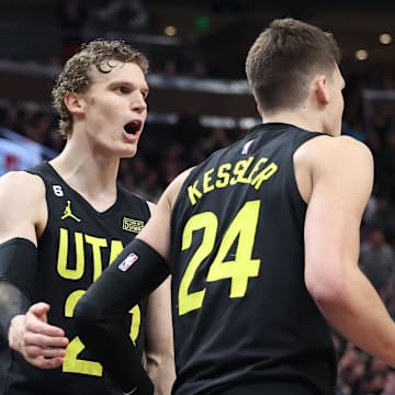 Feb 1, 2023; Salt Lake City, Utah, USA; Utah Jazz forward Lauri Markkanen (23) and center Walker Kessler (24) react to a foul by the Toronto Raptors in the fourth quarter at Vivint Arena. Mandatory Credit: Rob Gray-Imagn Images