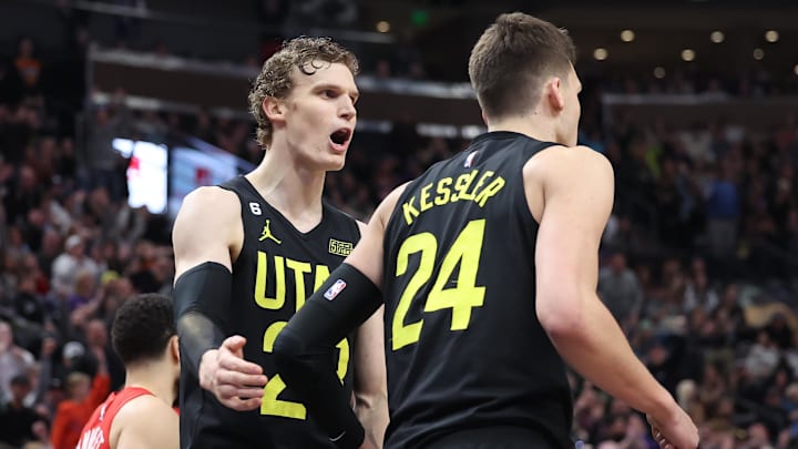 Feb 1, 2023; Salt Lake City, Utah, USA; Utah Jazz forward Lauri Markkanen (23) and center Walker Kessler (24) react to a foul by the Toronto Raptors in the fourth quarter at Vivint Arena. Mandatory Credit: Rob Gray-Imagn Images