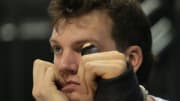 An injured Nate Bittle watches the game against Michigan Saturday, Dec. 2, 2023.