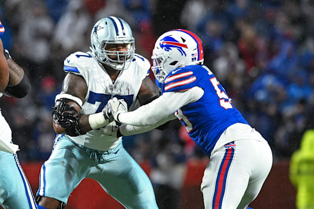 Dallas Cowboys offensive tackle Tyron Smith (77) blocks Buffalo Bills defensive end Kingsley Jonathan