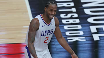 Feb 12, 2021; Chicago, Illinois, USA; LA Clippers forward Kawhi Leonard (2) pleads his case with an official during the third quarter against the Chicago Bulls at the United Center. Mandatory Credit: Dennis Wierzbicki-Imagn Images