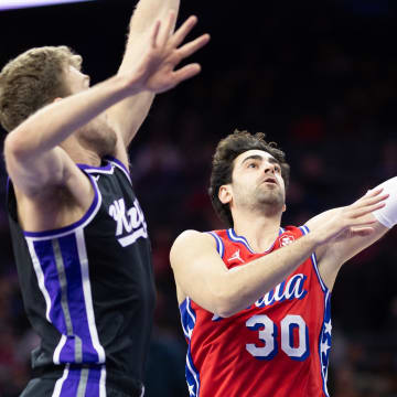 Jan 12, 2024; Philadelphia, Pennsylvania, USA; Philadelphia 76ers guard Furkan Korkmaz (30) drives for a shot against the Sacramento Kings during the fourth quarter at Wells Fargo Center. Mandatory Credit: Bill Streicher-USA TODAY Sports