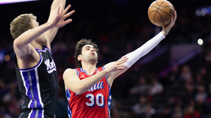 Jan 12, 2024; Philadelphia, Pennsylvania, USA; Philadelphia 76ers guard Furkan Korkmaz (30) drives for a shot against the Sacramento Kings during the fourth quarter at Wells Fargo Center. Mandatory Credit: Bill Streicher-USA TODAY Sports