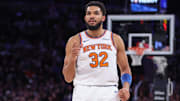 Dec 3, 2025; New York, New York, USA;  New York Knicks center Karl-Anthony Towns (32) reacts after scoring in the third quarter against the Charlotte Hornets at Madison Square Garden. Mandatory Credit: Wendell Cruz-Imagn Images
