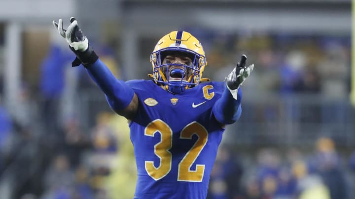 Oct 14, 2023; Pittsburgh, Pennsylvania, USA; Pittsburgh Panthers linebacker Shayne Simon (32) reacts after a defensive stop against the Louisville Cardinals during the fourth quarter at Acrisure Stadium. Pittsburgh won 38-21. Mandatory Credit: Charles LeClaire-USA TODAY Sports