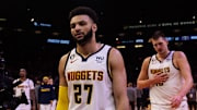 May 7, 2023; Phoenix, Arizona, USA; Denver Nuggets guard Jamal Murray (27), center Nikola Jokic (15) and forward Michael Porter Jr. (1) react against the Phoenix Suns during game four of the 2023 NBA playoffs at Footprint Center. Mandatory Credit: Mark J. Rebilas-Imagn Images