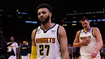 May 7, 2023; Phoenix, Arizona, USA; Denver Nuggets guard Jamal Murray (27), center Nikola Jokic (15) and forward Michael Porter Jr. (1) react against the Phoenix Suns during game four of the 2023 NBA playoffs at Footprint Center. Mandatory Credit: Mark J. Rebilas-Imagn Images