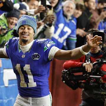 Nov 2, 2025; Landover, Maryland, USA; Seattle Seahawks wide receiver Jaxon Smith-Njigba (11) reacts to the win against the Washington Commanders at Northwest Stadium. 