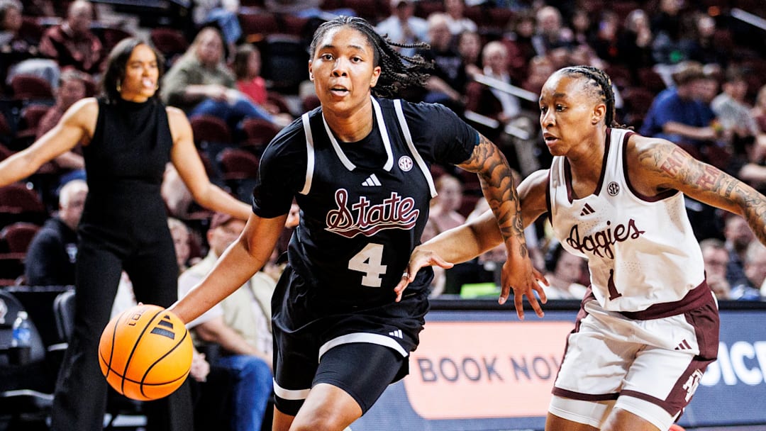 Mississippi State senior guard Trayanna Crisp drives past a Texas A&M defender during Thursday night's game against the Aggies. 